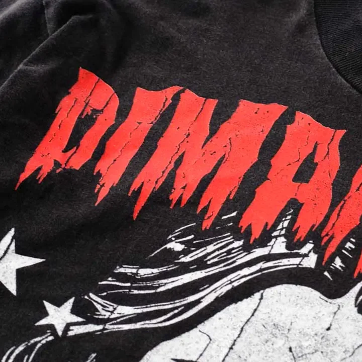 ตัวอย่างรายละเอียดงานสกรีน DTG บนเสื้อสีดำจาก Cottonora DTG