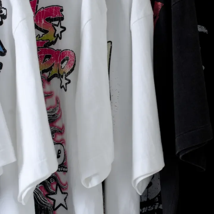 ตัวอย่างรายละเอียดงานสกรีน DTG บนเสื้อสีดำจาก Cottonora DTG