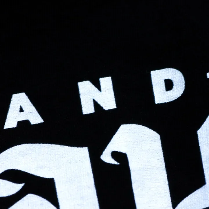 ตัวอย่างรายละเอียดงานสกรีน DTG บนเสื้อสีดำจาก Cottonora DTG